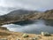 A crystal clear alpine lakes Laghi d`Orsirora during a beautiful autumn day in the mountainous area of the St. Gotthard Pass