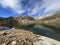 A crystal clear alpine lakes Laghi d`Orsirora during a beautiful autumn day in the mountainous area of the St. Gotthard Pass