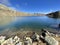 A crystal clear alpine lakes Laghi d`Orsirora during a beautiful autumn day in the mountainous area of the St. Gotthard Pass