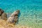 Crystal clear blue Adriatic sea rocky beach