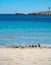 Crystal clear blue Mediterranean sea water on St.Croix Martigues beach and kids beach toys, Provence, France