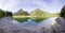 Crystal clear blue water, lake and mountains. Panorama of wild landscape, natural environment. Julian Alps, Triglav National Park