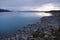 Crystal clear lake Pukaki at sunrise in New Zealand