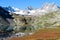 Crystal clear mountain mirror lake in autumn colors scenic view. Fall in the Altai Mountains, Russia