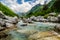 Crystal clear river Lumi i Thethit in National Park Theth in Albania