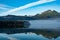 Crystal clear river reflecting scenic mountains and trees, Baranof island, Alaska