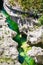 Crystal clear water in famous Canyon du Verde between mountains in France