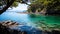 Crystal clear water and rocky cliffs in a serene coastal cove