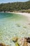 Crystal clear waters of a Leftos Gialos beach of Alonnisos island in Greece