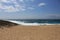 Crystal clear and wild waters in Praia da Foz, Sesimbra, Portugal