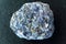 Crystal of cordierite iolite gem stone cutout, raw mineral, close up macro