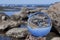 Crystal Glass Ball Sphere Reveals Seaside Rocky Landscape in Oregon