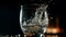 Crystal glass pouring cold whiskey, reflecting black background abstract motion generated by AI