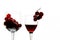 Crystal glasses with red grape and tasty wine on white background