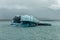 Crystal iceberg in front of Columbia glacier under the clouds