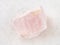 crystal of morganite (pink beryl) stone on white