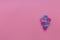 Crystal multicolored hearts on a pink horizontal background folded hearts