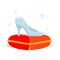Crystal slipper on red pillow. Luxurious cushion, fabulous coronation. Glass shoes fairy tales.