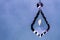 Crystal Teardrop Pendant, Hanging Against A Sky-like Background