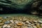 crystalclear water showcasing the rocky floor of a cave