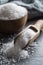 Crystaline sea salt in bowl and spoon - closeup