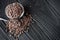 crystalline black Himalayan salt on a black wooden background