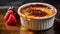 Crème Brûlée with a Crunchy Caramelized Sugar Crust. Blurred Background