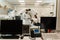 CT scan radiologist showing x-ray of brains to girl patient in computed scanning room. CT Doctor consulting patient and