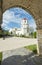 The Cuartel Ruins,and Our Lady of Conception Church,seen through an archway, Oslob,Cebu Island,The Philippines