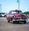 Cuba american Oldtimer taxi on the main road in Havana