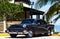 Cuba black american classic car on the beach