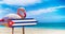 Cuba flag on wooden table sign on beach background with pink flamingo. There is beach and clear water of sea and blue sky in the