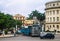 Cuba, Havana, downtown, old buildings, with camel bus in mid foreground