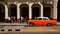 CUBA, HAVANA - JANUARY 16, 2019: Old American orange car in the old city of Havana