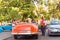 CUBA, HAVANA - MAY 5, 2017: American orange retro cabriolet on city street. Copy space for text. Back view.