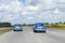 Cuba two old blue cars on the road