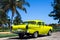 Cuba yellow classic cars in havana