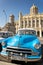 Cuban car in front of the Presidential palace in Havana