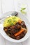 Cuban oxtail stew with yellow rice