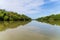 Cuban river landscape with abundant vegetation at the ends