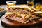 cuban sandwich with tortilla chips spread around it
