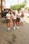 Cuban schoolgirls eating street food