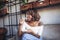 Cuban woman eating pizza in cafe