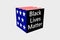 A cube consisting of a flag and an inscription, a concept of the black lives matter movement in America