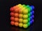 Cube formed from rainbow color balls