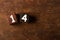 Cube numbers on old wooden table with copy space, 14