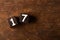 Cube numbers on old wooden table with copy space, 17