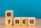 Cube shape calendar for December 07 on wooden surface with empty space for text