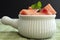 Cubed watermelon serving in a ceramic bowl