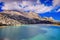 Cuber resevoir, lake, Puig Major, Tramuntana, weather station, trees,rocks, sunlight, low white clouds, turquoise water, Mallorca